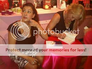 Rebecca & Stella signing books....